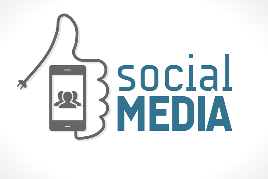 Cell phone cord creating a thumbs up with Social Media text.