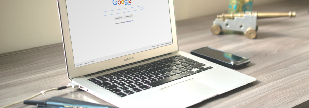 Mac laptop with Google search window open