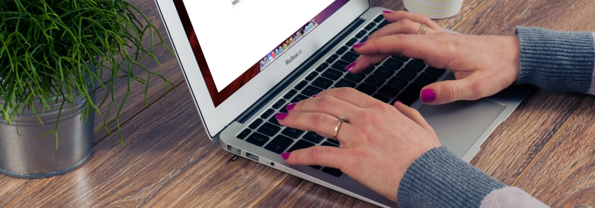 Women using MacBook Air to view Google Browser
