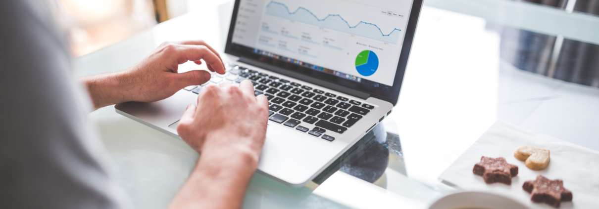 Man viewing analytics on computer