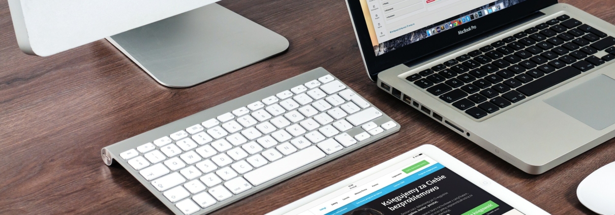 Website design on desktop, laptop and tablet.