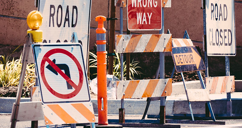 Various wrong way, road closed, and no turn signs