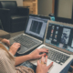 Two people with laptops on their laps browsing online