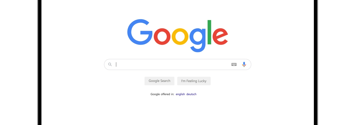The Google Search home screen on a laptop.